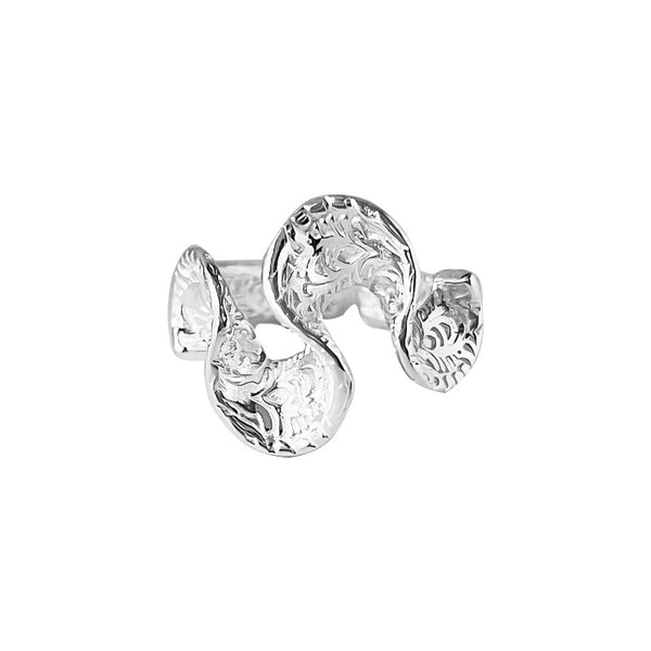 Close-up of handmade wave ring texture - sculptural 925 silver craftsmanship